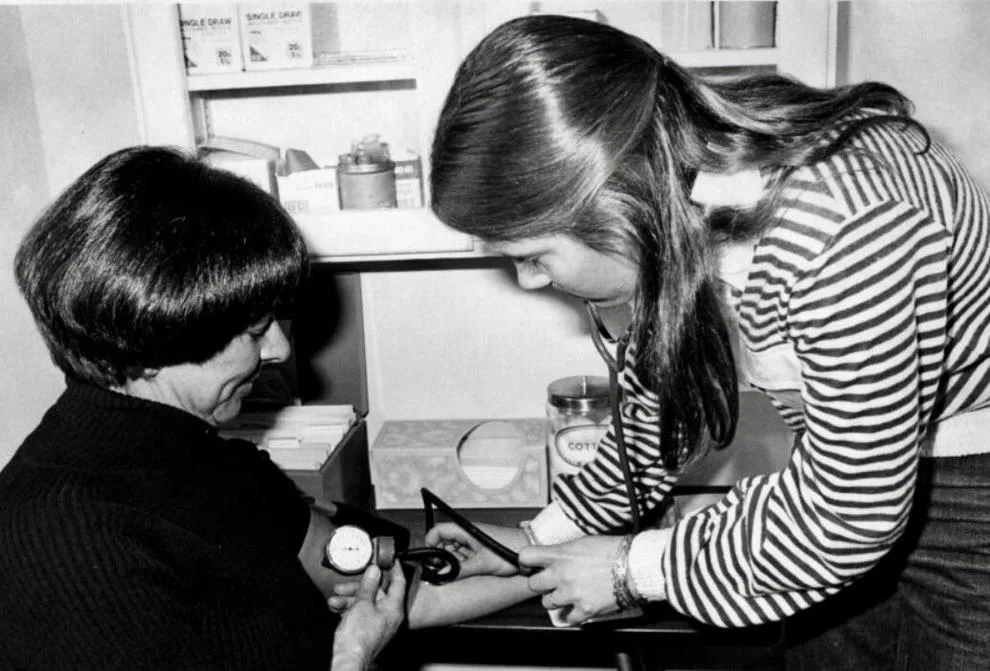This black-and-white photograph originally ran in the Feb. 15, 1979, edition of The Aspen Times. Ina Claire McTarnaghan has her blood pressure taken by Lisa Timroth, a student nurse’s aide. Through the Aspen Visiting Nurses, Colorado Mountain College and the hospital, students learned community health skills for high school credit.